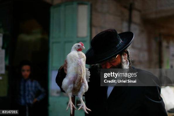 Kaparot Ritual An Ultra-Orthodox Jewish man performs the kaparot ceremony, October ...