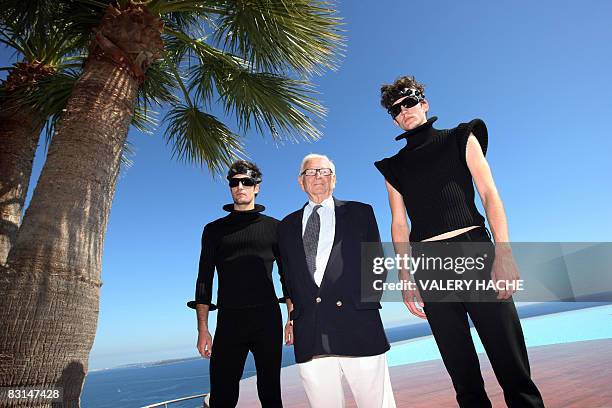 French designer Pierre Cardin poses with models after is spring/summer 2009 ready-to-wear collection show in Theoule-Sur-Mer, southern France, on...