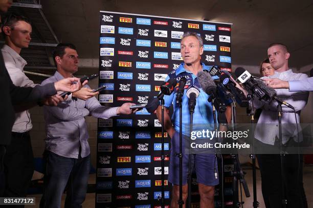 Coach Neil Henry speaks to the media during a Gold Coast Titans NRL press conference at Titans Headquarters on August 15, 2017 in Gold Coast,...