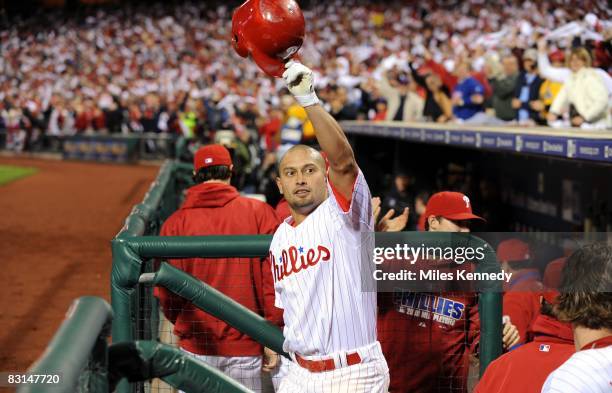 Shane Victorino of the Philadelphia Phillies makes a curtain call after hitting a grand slam in the second inning during the game against the...