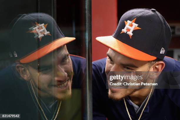 Pitcher Joe Musgrove of the Houston Astros talks with fans before the start of the MLB game against the Arizona Diamondbacks at Chase Field on August...