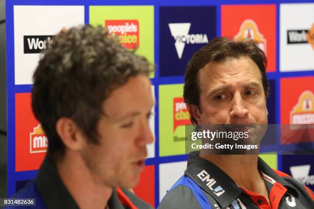 Robert Murphy of the Western Bulldogs and coach Luke Beveridge talk to the media following the announcement that Murphy will retire from AFL during a...