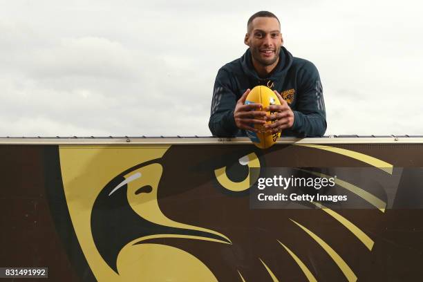 Hawthorn Hawks defender Josh Gibson poses for a photo following his AFL retirement announcement during a press conference at Waverley Park on August...