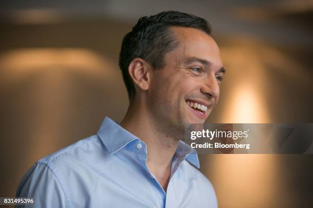 Nathan Blecharczyk, co-founder and chief technology officer of Airbnb Inc., reacts during a Bloomberg Television interview in Singapore, on Tuesday,...