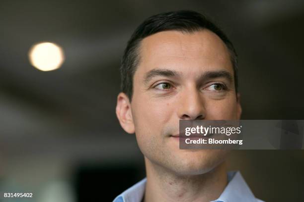 Nathan Blecharczyk, co-founder and chief technology officer of Airbnb Inc., listens during a Bloomberg Television interview in Singapore, on Tuesday,...
