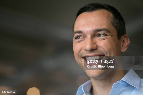 Nathan Blecharczyk, co-founder and chief technology officer of Airbnb Inc., reacts during a Bloomberg Television interview in Singapore, on Tuesday,...