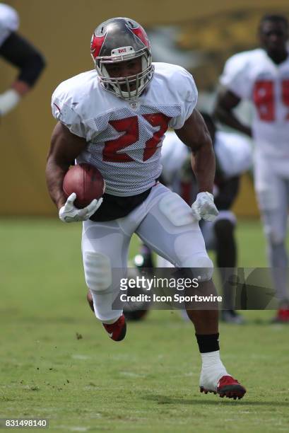 Tampa Bay Buccaneers running back Doug Martin runs with the ball during the Buccaneers joint practice with the Jacksonville Jaguars on August 14,...