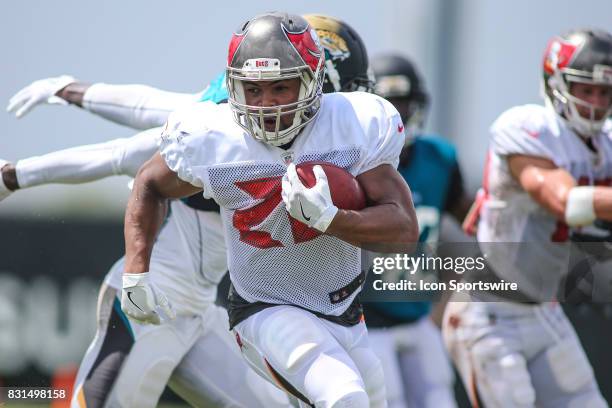 Tampa Bay Buccaneers running back Doug Martin runs with the ball during the Buccaneers joint practice with the Jacksonville Jaguars on August 14,...