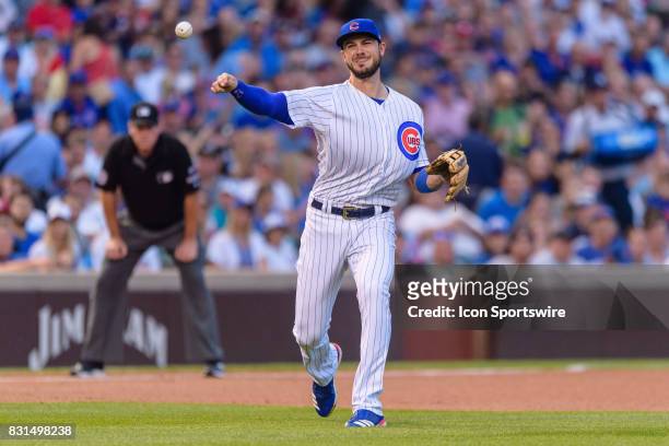 Chicago Cubs third baseman Kris Bryant throws out Cincinnati Reds center fielder Billy Hamilton in the 1st inning during an MLB game between the...