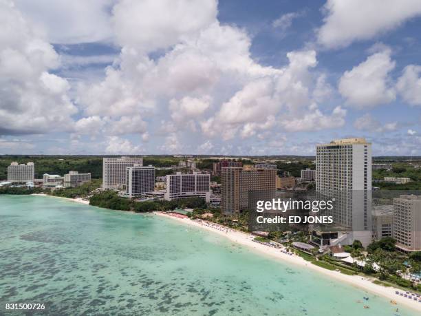 This photograph taken using a drone shows a beach in the Tamuning area of Guam on August 15, 2017. - Guam officials were "ecstatic" on August 15 as...