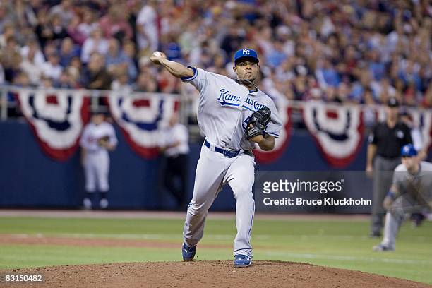 Ramon Ramirez of the Kansas City Royals throws to first to check a runner from Minnesota Twins at the Humphrey Metrodome in Minneapolis, Minnesota on...
