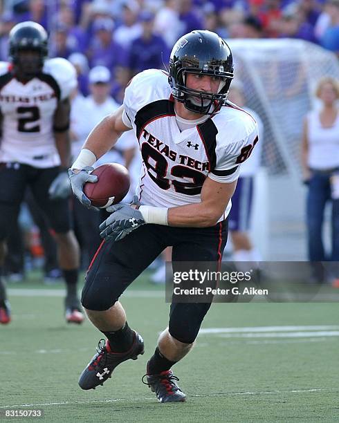 Wide receiver Adam James of the Texas Tech Red Raiders rushes down field after making a catch in the second half, during a game against the Kansas...