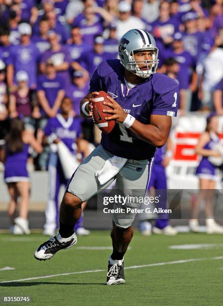 Quarterback Josh Freeman of the Kansas State Wildcats rolls to the outside as he looks down field in the first half, during a game against the Texas...