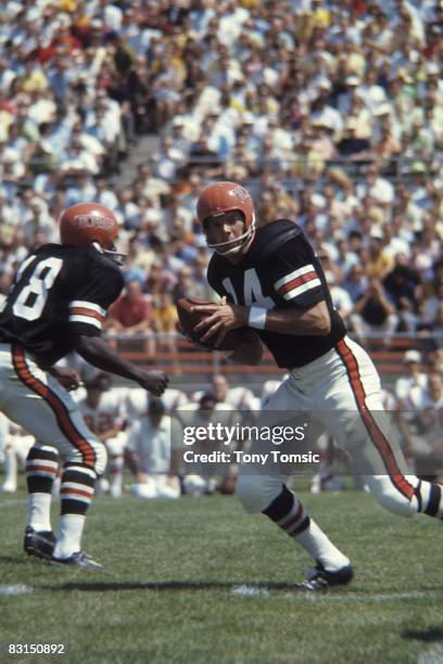 Quarterback Sam Wyche of the Cincinnati Bengals drops back to passl during a preseason game on August 10, 1969 against the Boston Patriots in Bowling...