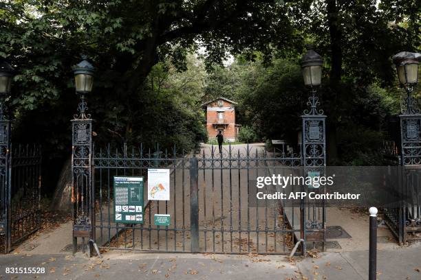 Picture the entrance to the Buttes-Chaumont Park on the Simon Bolivar Avenue in Paris on August 12, 2017. The Buttes-Chaumont Park, created in 1867,...