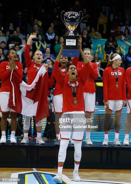 Kia Nurse of Canada lifts the trophy to celebrate after winning the match between Argentina and Canada as part of the FIBA Women's AmeriCup Final at...