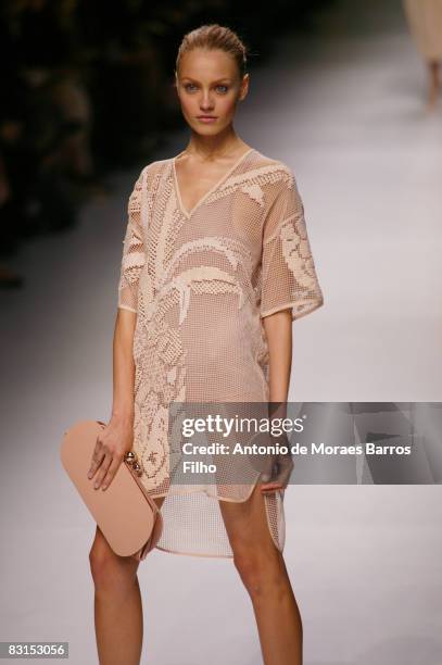 Model walks the runway at the Stella McCartney fashion show during Paris Fashion Week at the Carreau du Temple on October 2, 2008 in Paris, France.