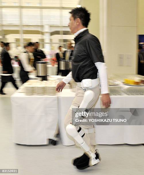 Model displays the newly developed robot-suit "HAL" , produced by Cyberdyne at the company's new R and D center at Tsukuba city in Ibaraki...