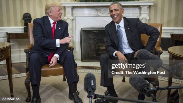 President Barack Obama shakes talks with President-elect Donald Trump in the Oval Office of the White House in Washington, Thursday, Nov. 10, 2016.