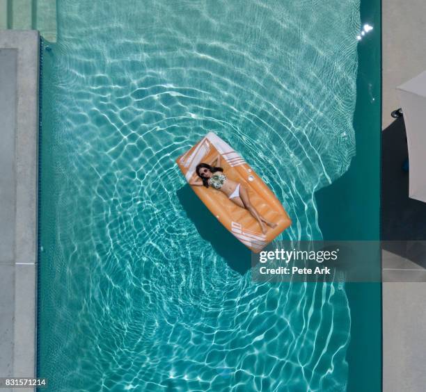 Pool Float From Above 212 Pool Float View From Above Stock Photos, High-Res Pictures, and ...