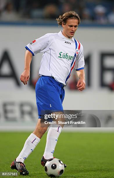 Heath Pearce of Rostock runs with the ball during the Second Bundesliga match between FC Hansa Rostock and FC St. Pauli at the DKB Arena on September...