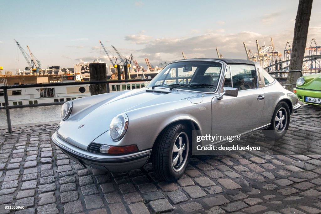 A parking Porsche 911 during the "Magnus Walker meeting" in Hamburg at the fish market