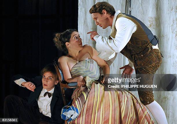 Singers perform on October 2 at Lille's Opera, northern France, in the Mozart's Noces de Figaro opera by French director Jean-Francois Sivadier and...