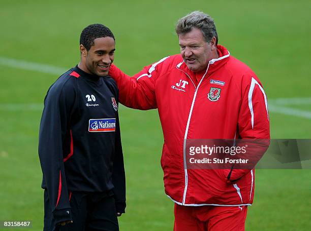 Wales manager John Toshack chats to Ashley Williams during Wales Football training at the Vale Hotel on October 7, 2008 in Cardiff, Wales.
