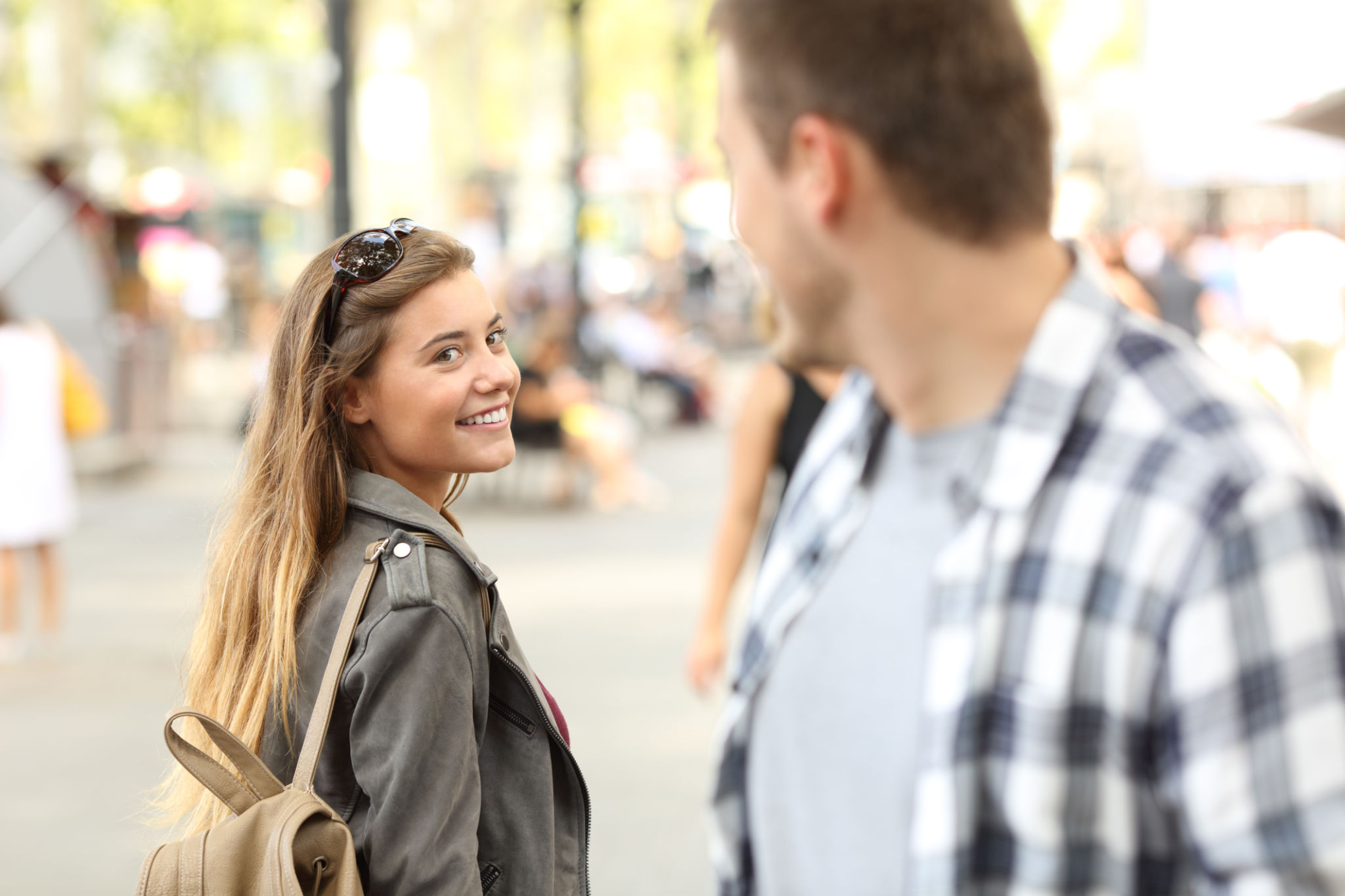 Strangers girl and guy flirting on the street Strangers girl and guy flirting on the street