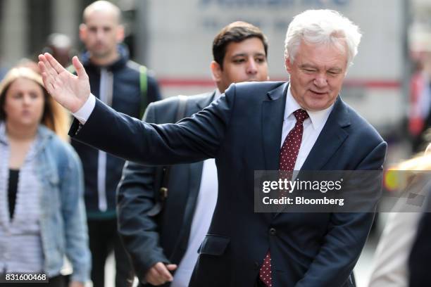 David Davis, U.K. Exiting the European Union secretary, walks in-between doing media interviews in London, U.K., on Tuesday, Aug. 15, 2017. The U.K....