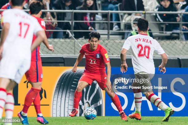 Choi Chulsoon of Korea Republic is tackled by Kahled Almbayed of Syria during their 2018 FIFA World Cup Russia Final Qualification Round Group A...
