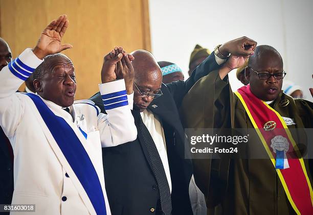 Reverend John Molefe Moloi, Arch Bishop Daniel Mathe and President Jacob Zuma at the St John Apostolic Church on August 12, 2017 in Johannesburg,...