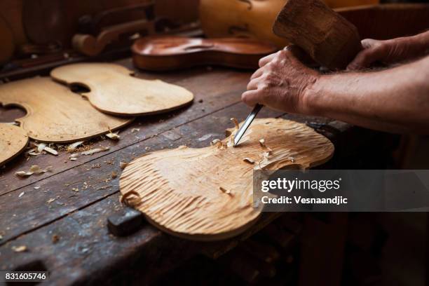 senior violin maker - instrument maker stock pictures, royalty-free photos & images