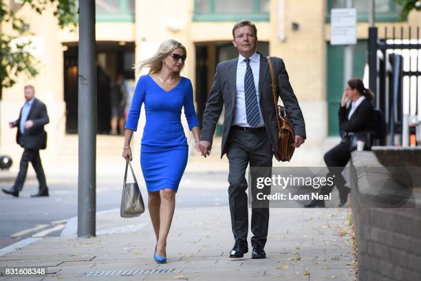 Conservative MP Craig Mackinlay arrives at Southwark Crown Court with his wife Kati, ahead of the trial into charges of illegal election spending...