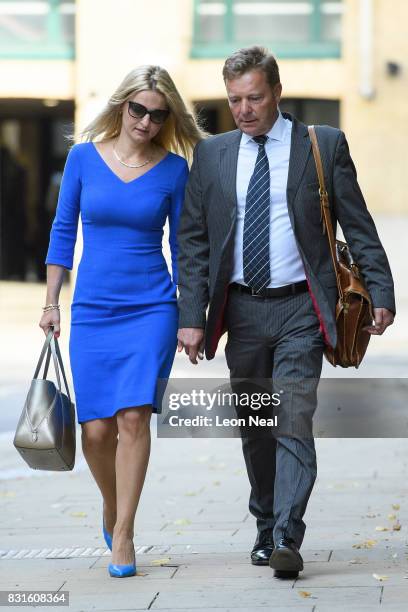 Conservative MP Craig Mackinlay arrives at Southwark Crown Court with his wife Kati, ahead of the trial into charges of illegal election spending...