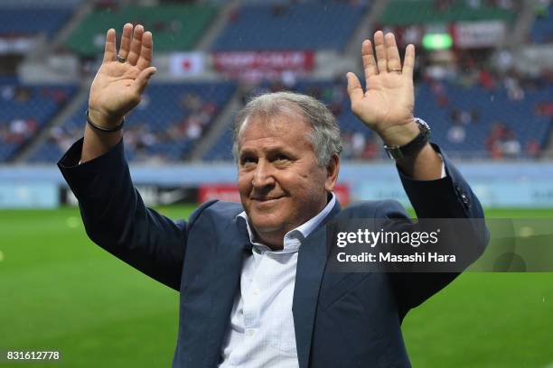 Zico waves to supporters during the Japan Football Hall of Fame Award Ceremony prior to the Suruga Bank Championship match between Urawa Red Diamonds...