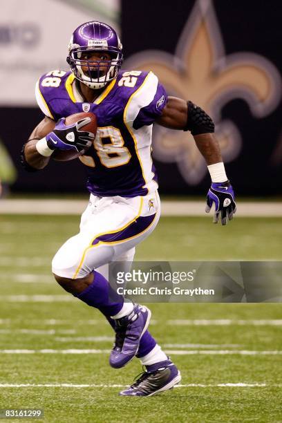 Adrian Peterson of the Minnesota Vikings runs against the New Orleans Saints on October 6, 2008 at the Superdome in New Orleans, Louisiana.