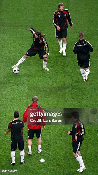 Torsten Frings stopps the ball during the training session of the German National team and the German fan party at the TUI Arena on October 7, 2008...