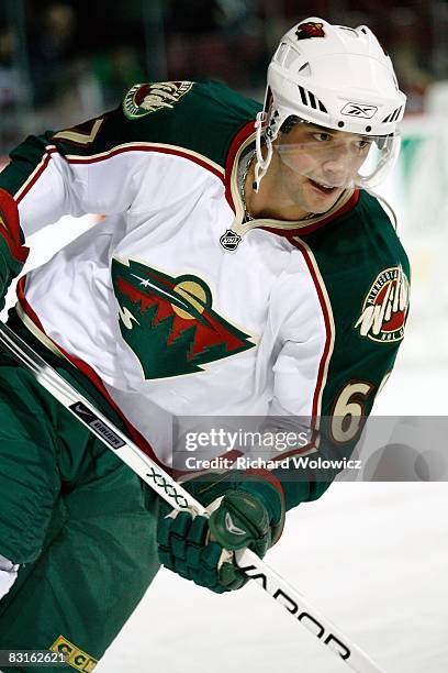 Benoit Pouliot of the Minnesota Wild skates during the warm up period prior to facing the Montreal Canadiens at the Bell Centre on October 04, 2008...