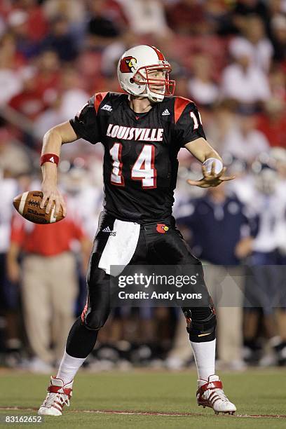 Quarterback Hunter Cantwell of the Louisville Cardinals looks to pass the ball during the Big East game against the Connecticut Huskies on September...