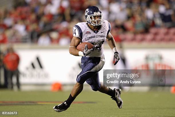 Donald Brown of the Connecticut Huskies carries the ball during the Big East game against the Louisville Cardinals on September 26, 2008 at Papa...