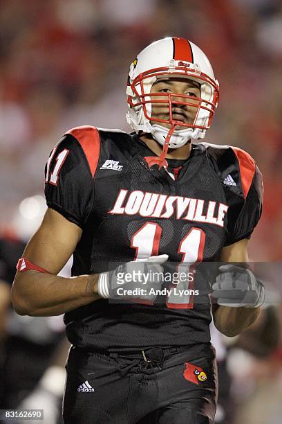 Greg Scruggs of the Louisville Cardinals jogs on the field during the Big East game against the Connecticut Huskies on September 26, 2008 at Papa...