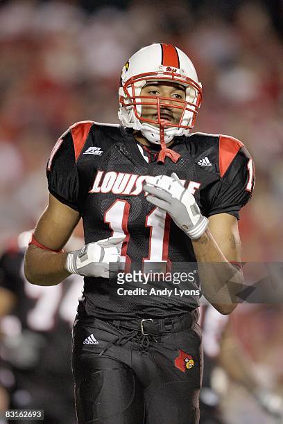 Greg Scruggs of the Louisville Cardinals jogs on the field during the Big East game against the Connecticut Huskies on September 26, 2008 at Papa...