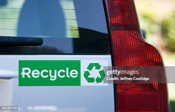 recycle bumper sticker on car - bumper sticker stock pictures, royalty-free photos & images