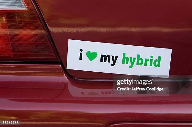 love my hybrid bumper sticker on car - bumper stock-fotos und bilder