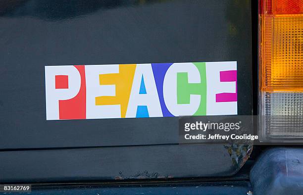 peace bumper sticker on car - bumper sticker stock-fotos und bilder