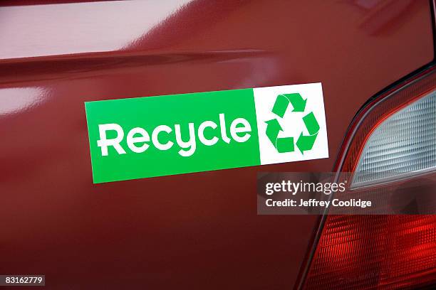 recycle bumper sticker on car - bumper stock-fotos und bilder