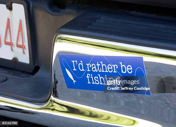fishing bumper sticker on car - bumper sticker stock pictures, royalty-free photos & images