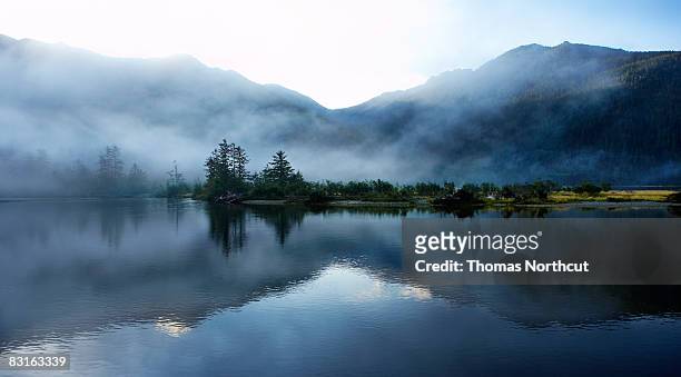 morning light  and mist across sound and mountains - lake stock pictures, royalty-free photos & images