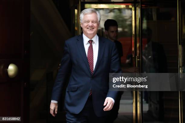 David Davis, U.K. Exiting the European Union secretary, walks in-between doing media interviews in London, U.K., on Tuesday, Aug. 15, 2017. The U.K....